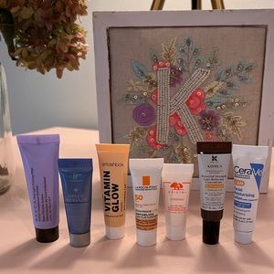 33 assorted skincare samples in a makeup bag